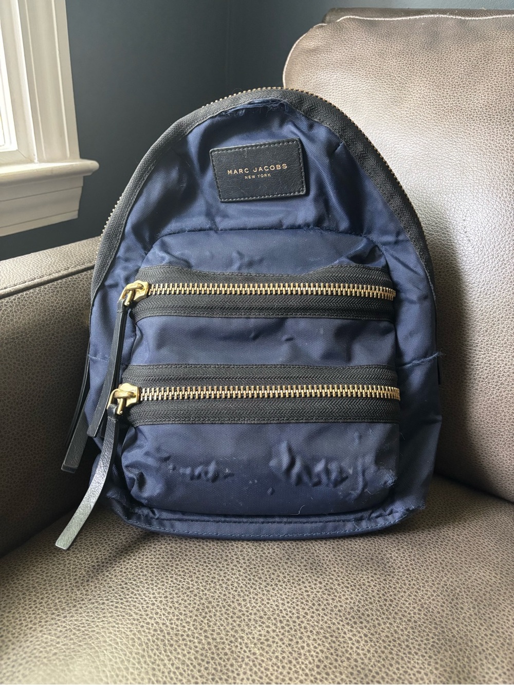 Marc Jacobs Navy Nylon Mini Backpack with Gold Hardware needs some love